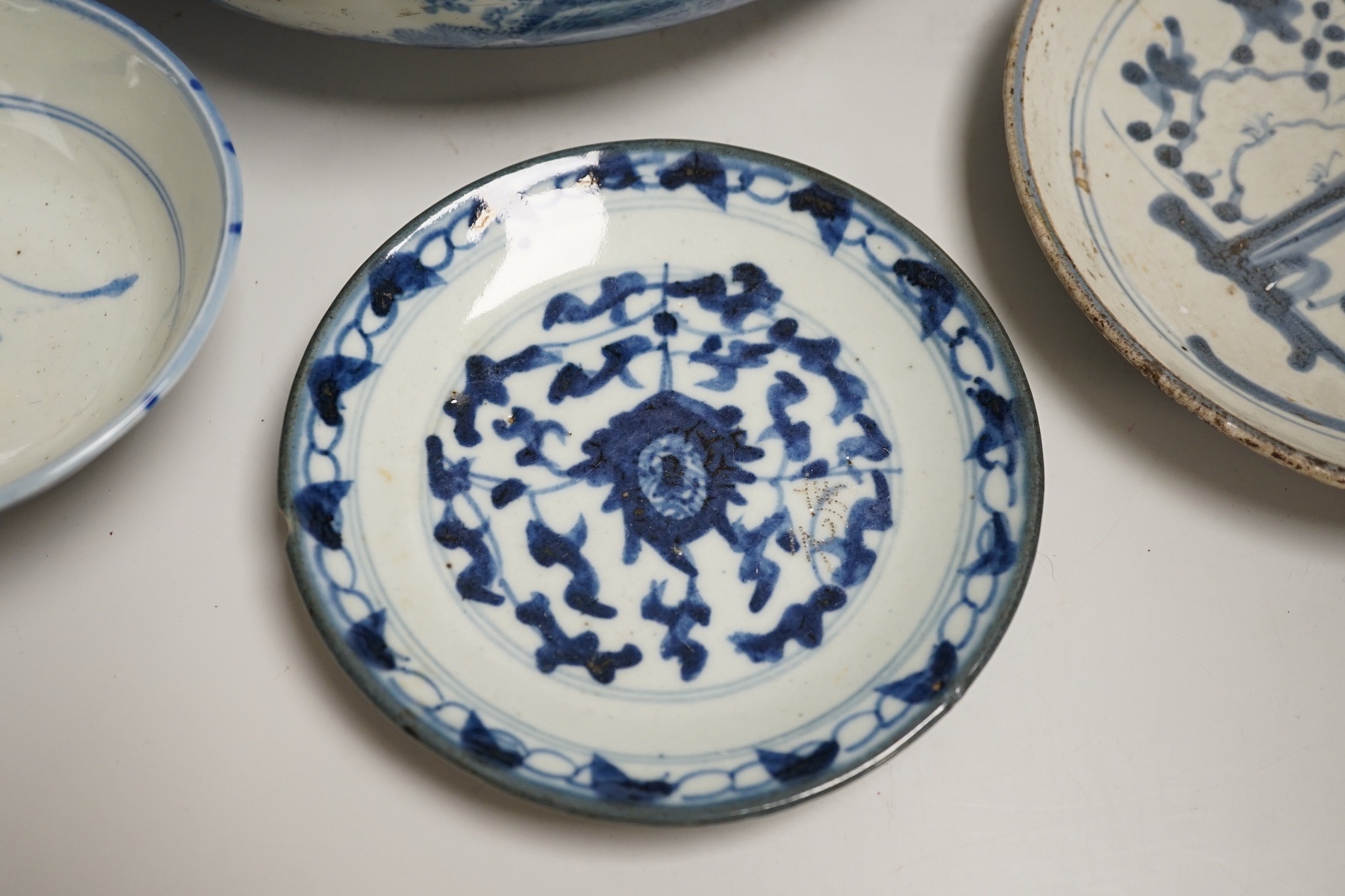 A Chinese blue and white bowl, tea bowl and saucer, and two other dishes, largest 29cm diameter